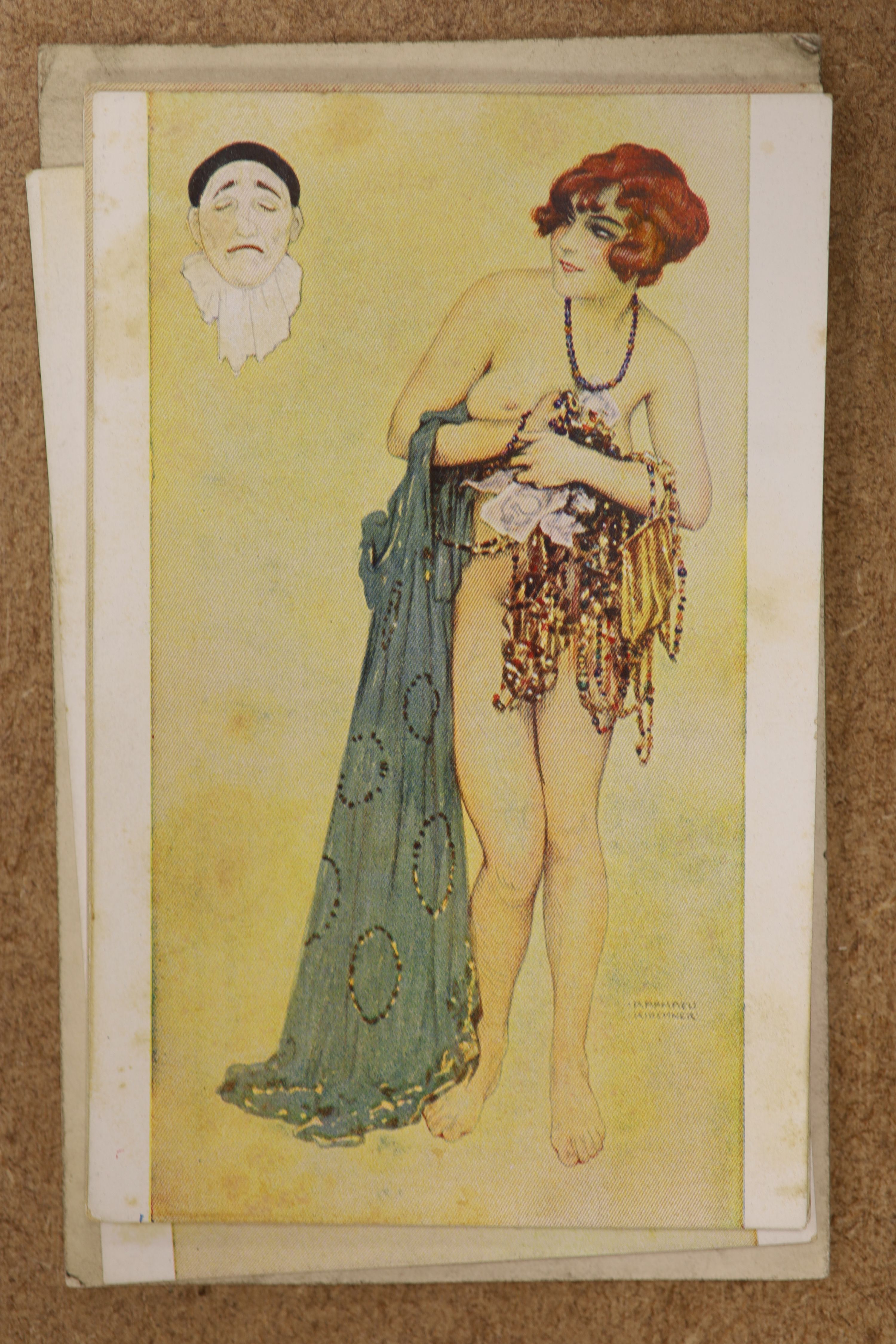 Three albums of photographs and a quantity of postcards inc. erotica.